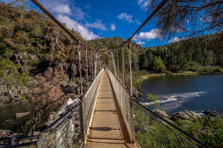 Scenic suspension bridge and river